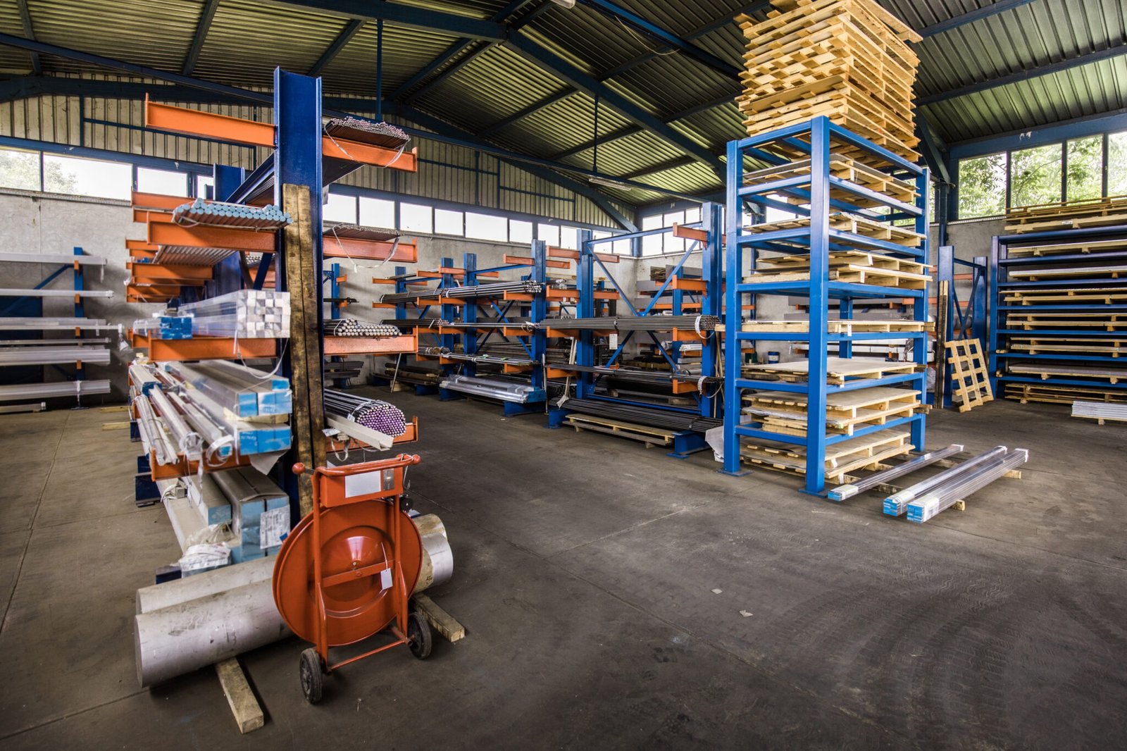 Cantilever racking used for storing heavy metal pipes and timber lumber.